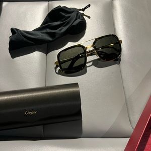 Men Cartier sunglasses. Given as a gift .